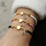 Load image into Gallery viewer, Adjustable Shape Letter Initial Bracelets
