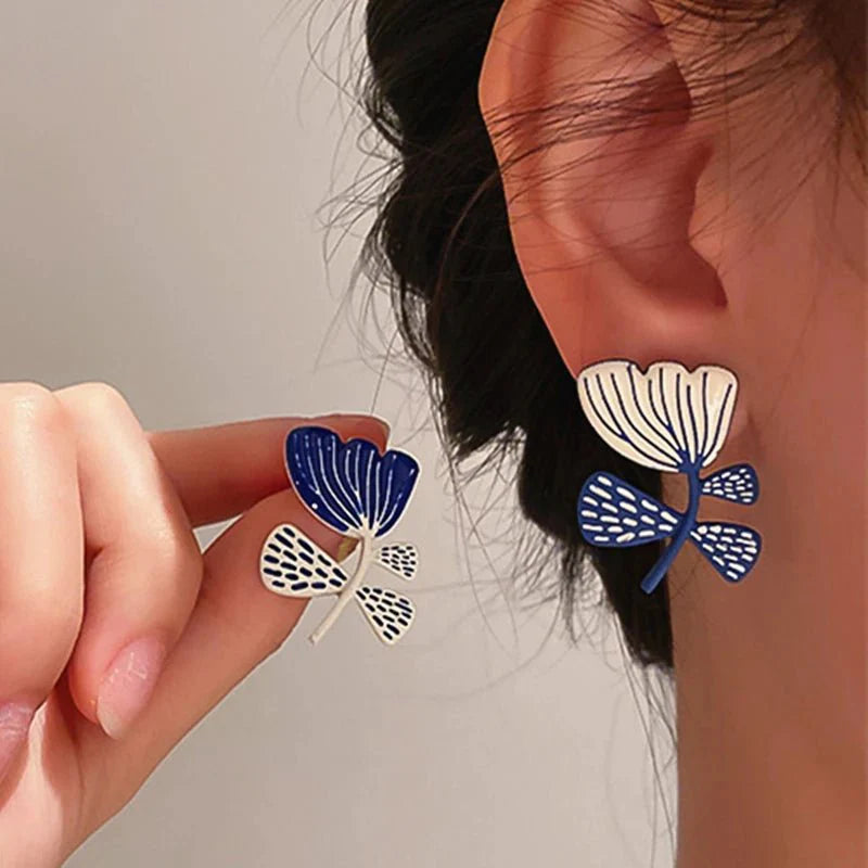 Artistic blue white floral earrings 762460
