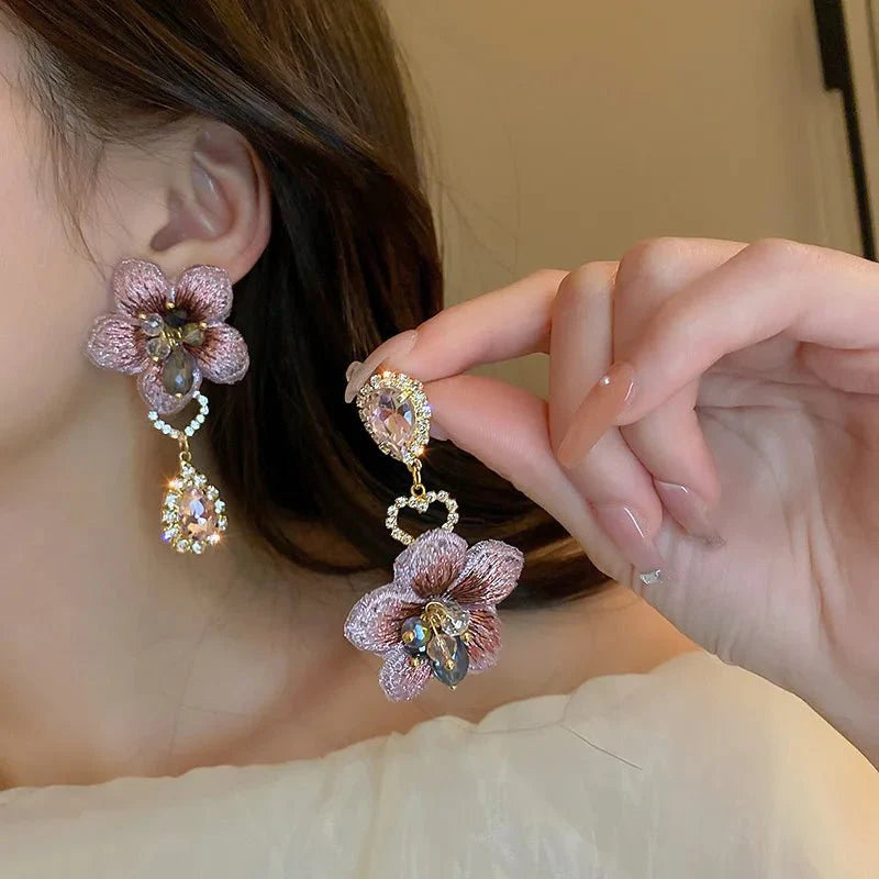 Asymmetrical oriental hibiscus crystal earrings 818950
