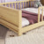 Natural Finish Twin Toddler Floor Bed with Built-in Book Storage Rack