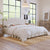 King Upholstered Platform Bed With Curved Headboard and Diamond Tufted Details