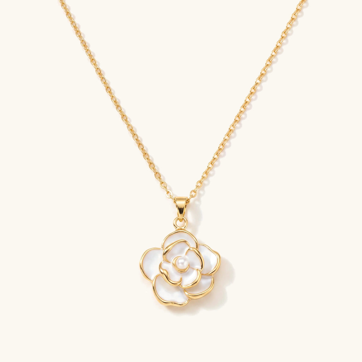 Dainty blanc camellia flower pendant necklace in gold with white petals