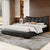 Black Queen Leather Upholstered Bed with Wingback Headboard