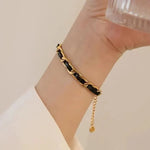 Load image into Gallery viewer, Braided Gold and Black Chain Leather Bracelet
