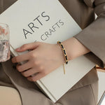 Load image into Gallery viewer, Braided Gold and Black Chain Leather Bracelet
