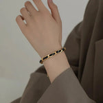 Load image into Gallery viewer, Braided Gold and Black Chain Leather Bracelet
