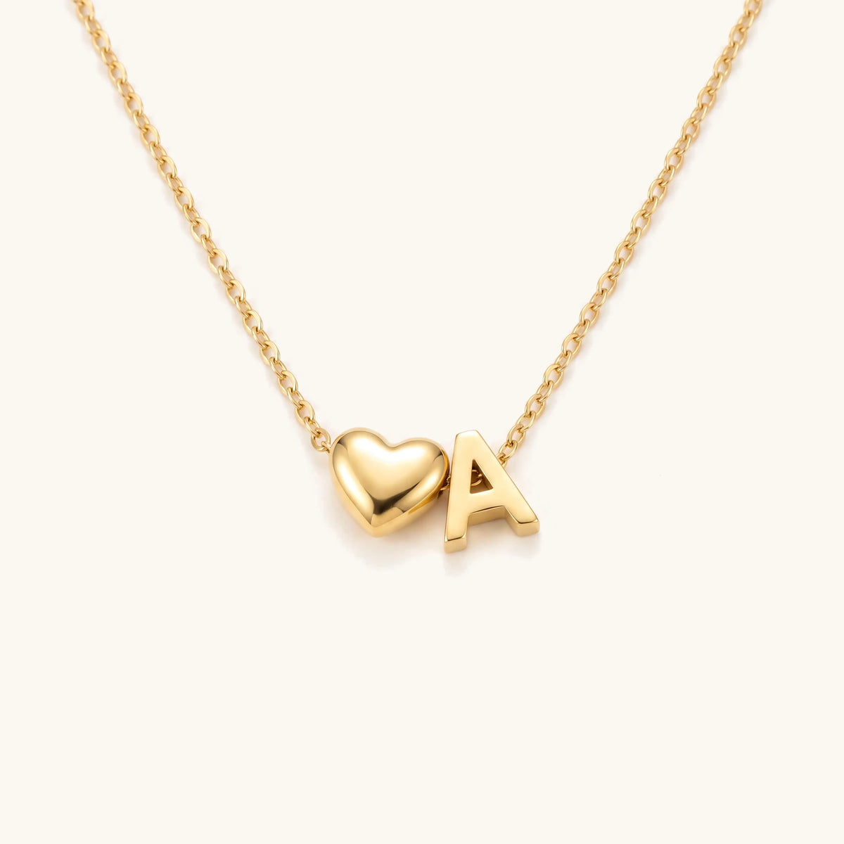 Love Letter Necklace – gold heart and initial charms on a fine chain