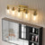 Modern Golden Iron Vanity Light with Clear Glass Shades