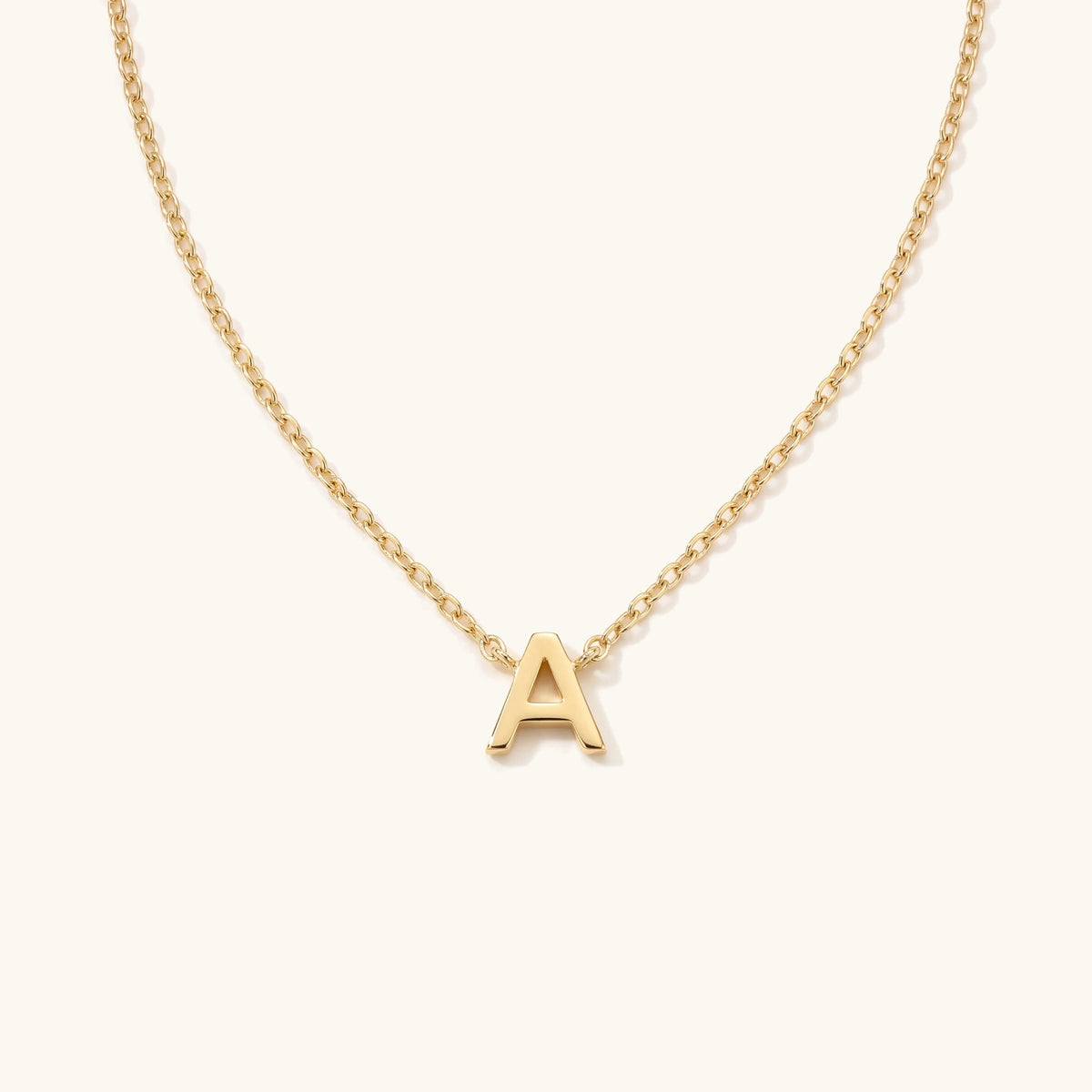 Cecina Initial Letter Necklace – tiny gold initial on a fine cable chain