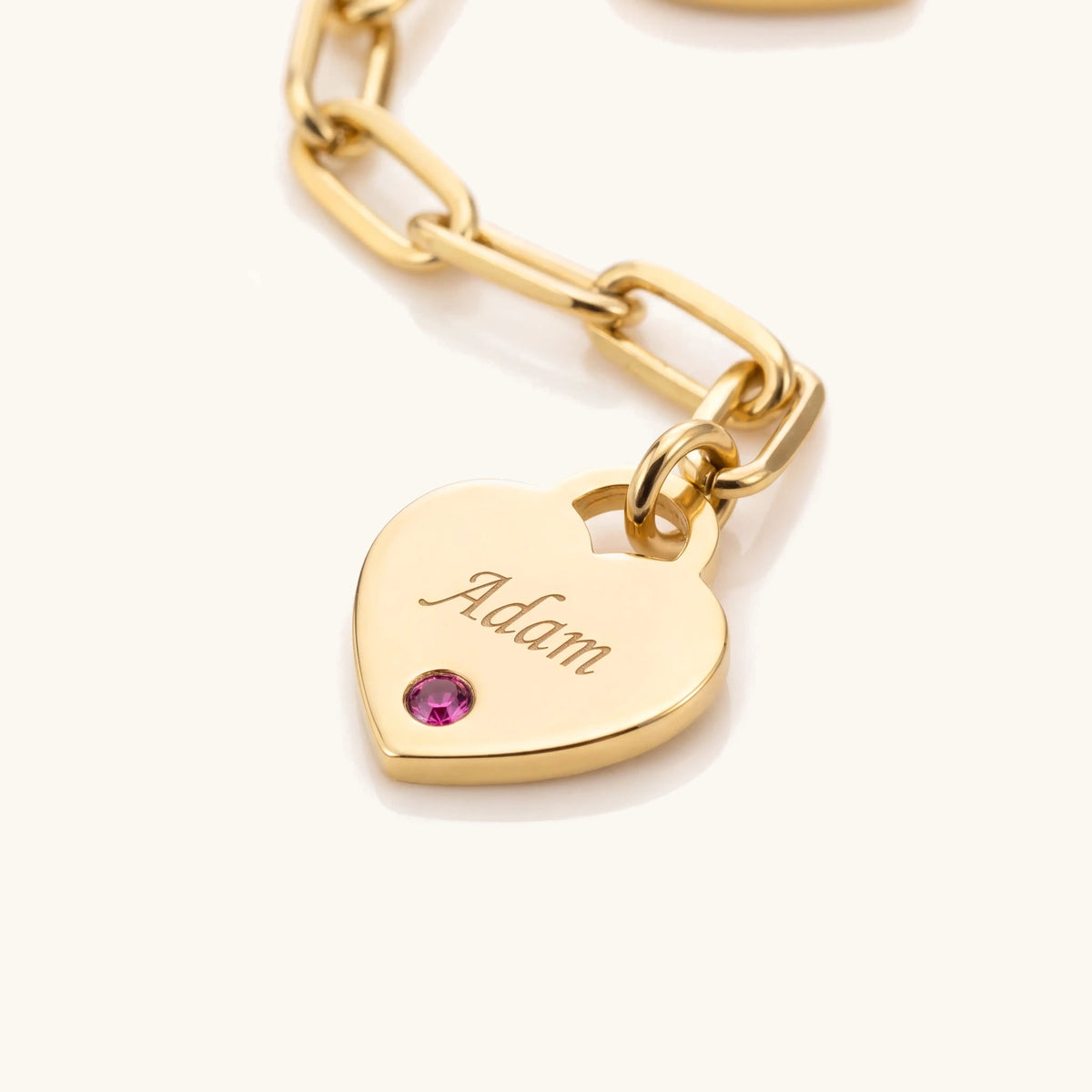 Dainty Name & Birthstone Heart Charm Paperclip Bracelet – close-up of an engraved name heart with birthstone