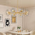 Aestin's Modern Gold 8-Light Sputnik Chandelier with Clear Glass Shades