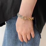 Load image into Gallery viewer, Chunky Two Tone Textured Circle Clasp Bracelet
