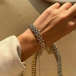 Load image into Gallery viewer, Chunky Two Tone Textured Circle Clasp Bracelet
