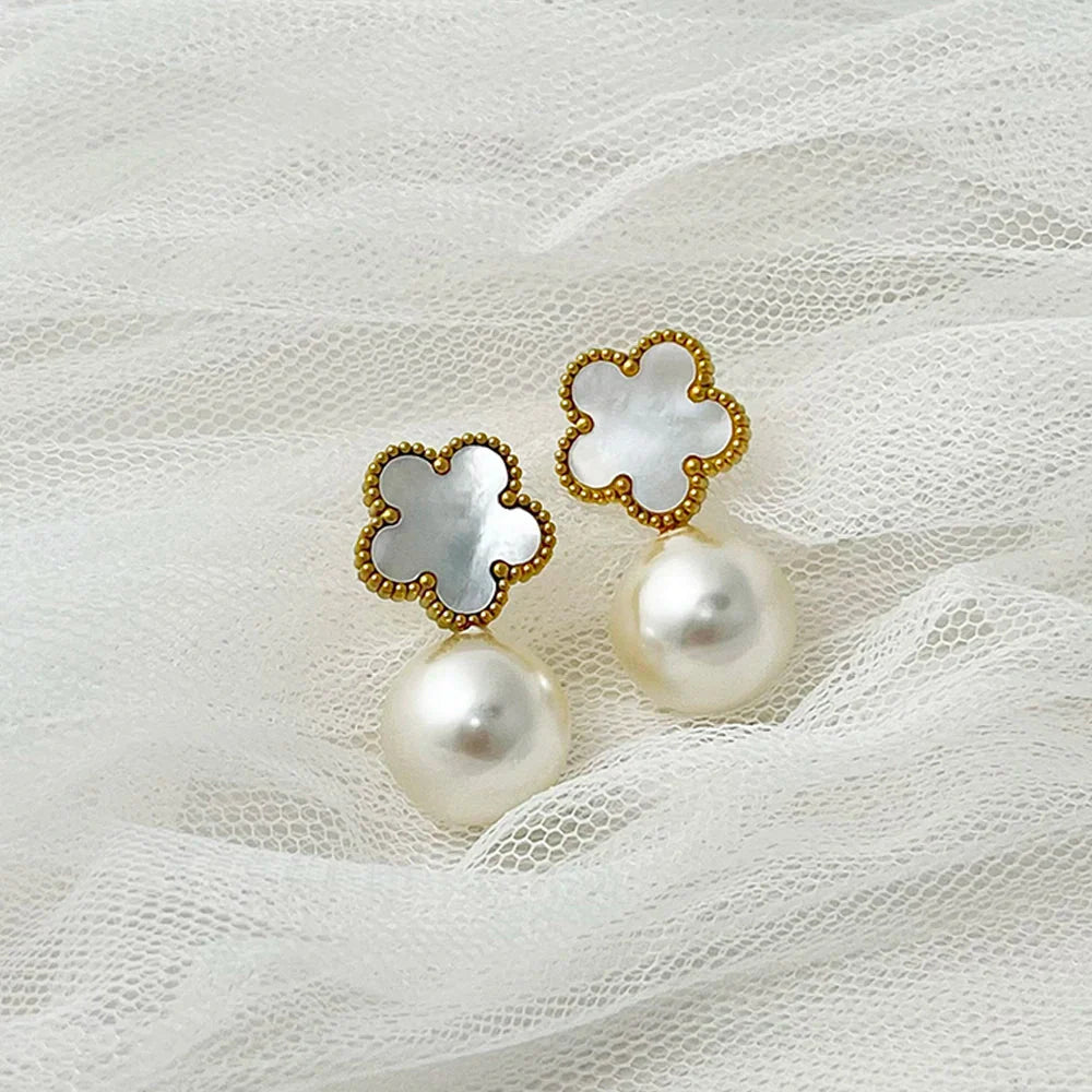 Classy floral pearl ball earrings 668178