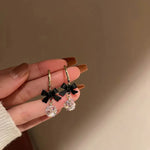 Load image into Gallery viewer, Dainty Bow Diamond Dangle Earrings
