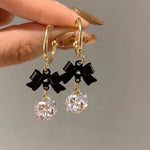 Load image into Gallery viewer, Dainty Bow Diamond Dangle Earrings
