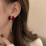 Load image into Gallery viewer, Dainty Bow Gold Dangle Earrings
