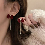 Load image into Gallery viewer, Dainty Bow Gold Dangle Earrings
