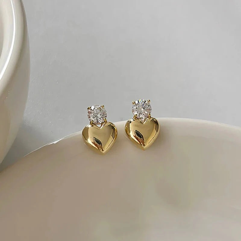 Dainty diamond heart stud earrings 679982