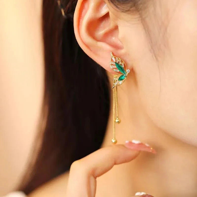Dainty emerald butterfly dangle earrings