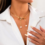 Load image into Gallery viewer, Dainty Herringbone Pearl Bow Necklace
