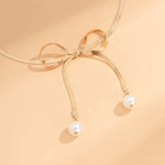 Load image into Gallery viewer, Dainty Herringbone Pearl Bow Necklace
