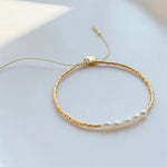 Load image into Gallery viewer, Dainty Pearl Golden Beaded Bracelet
