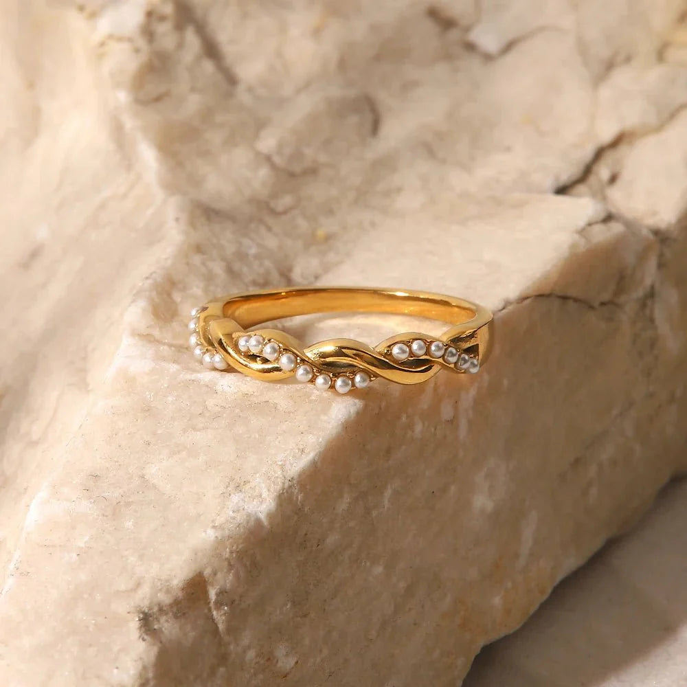 Dainty pearl intertwined ring