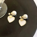 Load image into Gallery viewer, Dainty Pearl Stud Heart Shell Earrings
