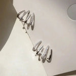 Load image into Gallery viewer, Dainty Shimmering Claw Huggie Earrings
