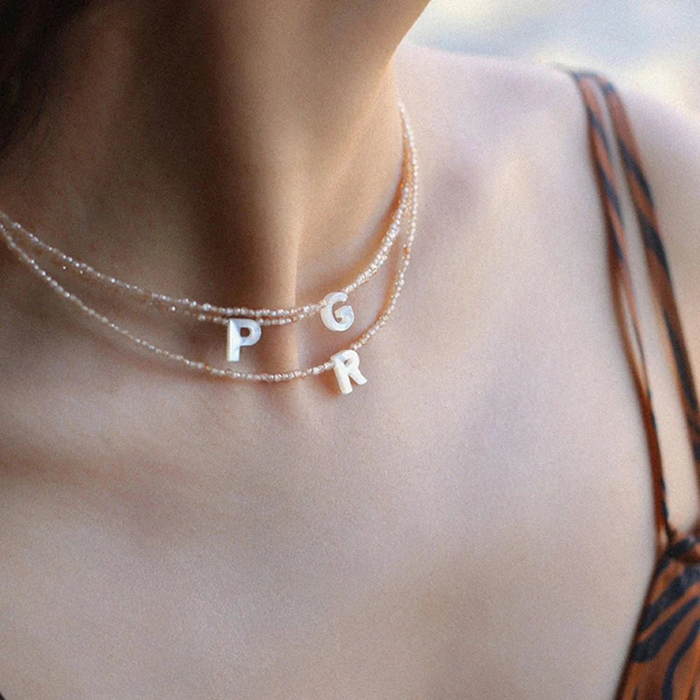 Dainty stone beaded initial necklace