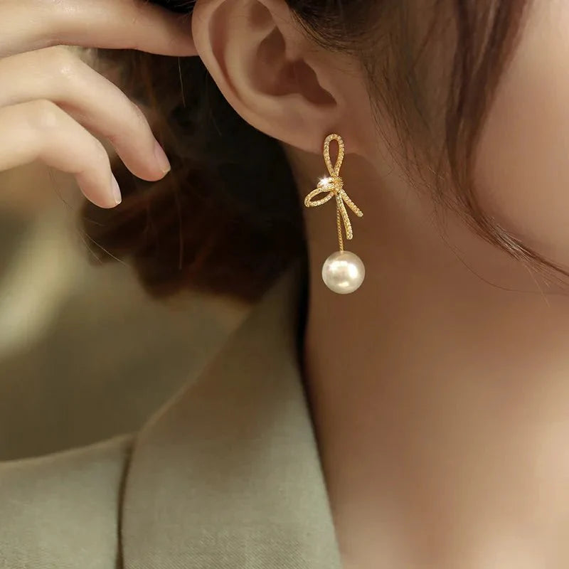 Dazzling bowknot pearl drop earrings