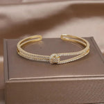 Load image into Gallery viewer, Diamond Knot Cuff Bracelet
