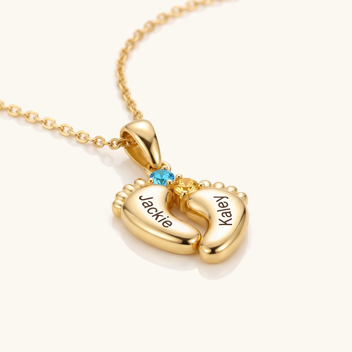 Personalized Baby Feet Name & Birthstone Necklace – angled close-up of the engraved baby feet