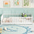 White Twin Toddler Floor Platform Bed with Built-in Book Storage Rack