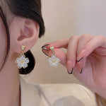 Load image into Gallery viewer, Elegant Gold Accented Floral Earrings
