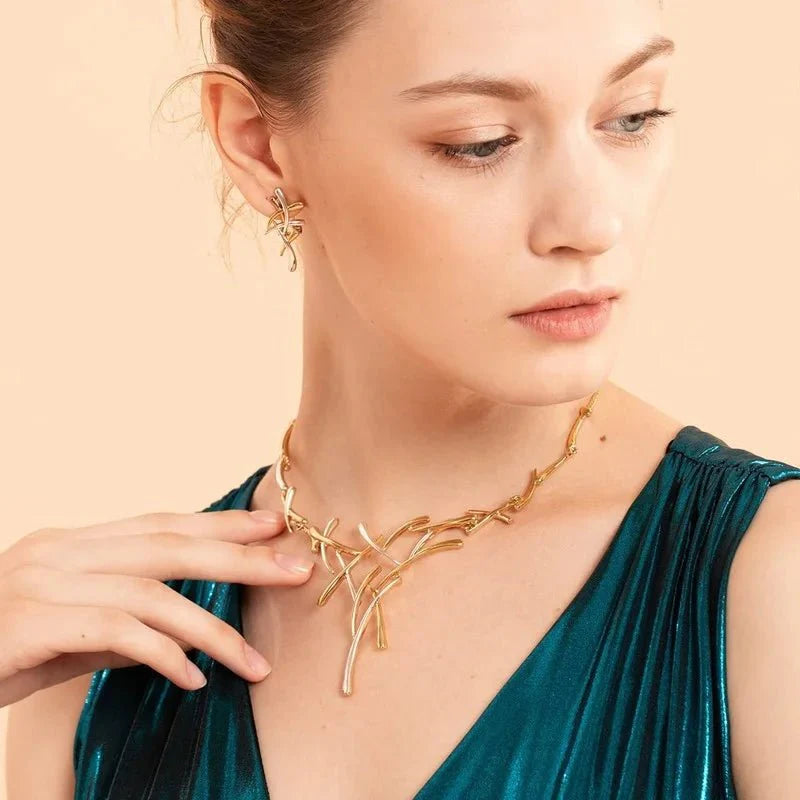 Elegant two tone branch cross necklace and earring set