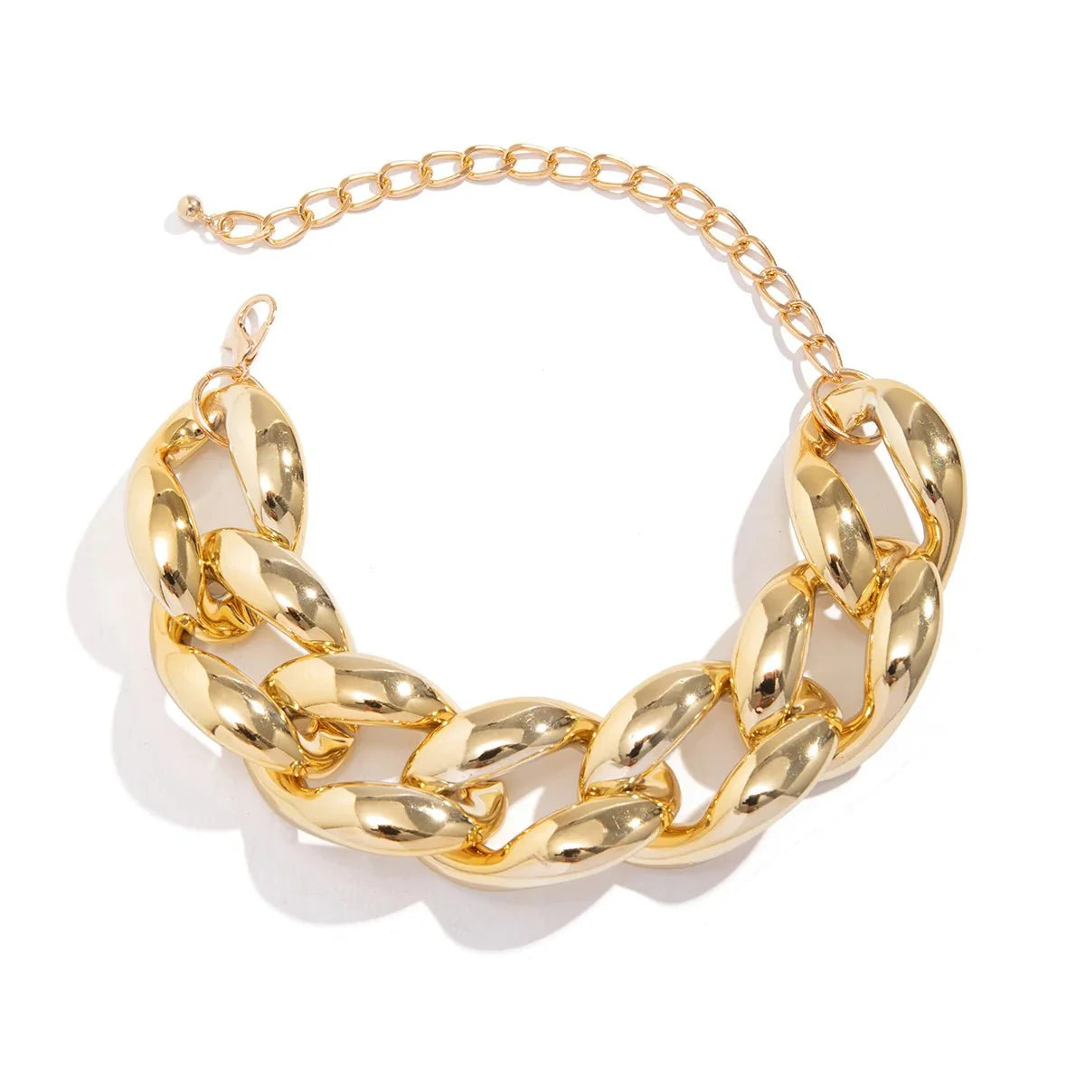 Exaggerated Chunky Cuban Link Choker Necklace gold chunky Cuban link chain displayed on a white background.