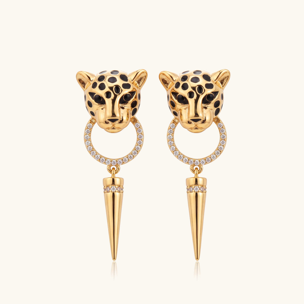 Leopard Circle Dangle Earrings – pair of gold leopard print circle earrings on a soft ivory background