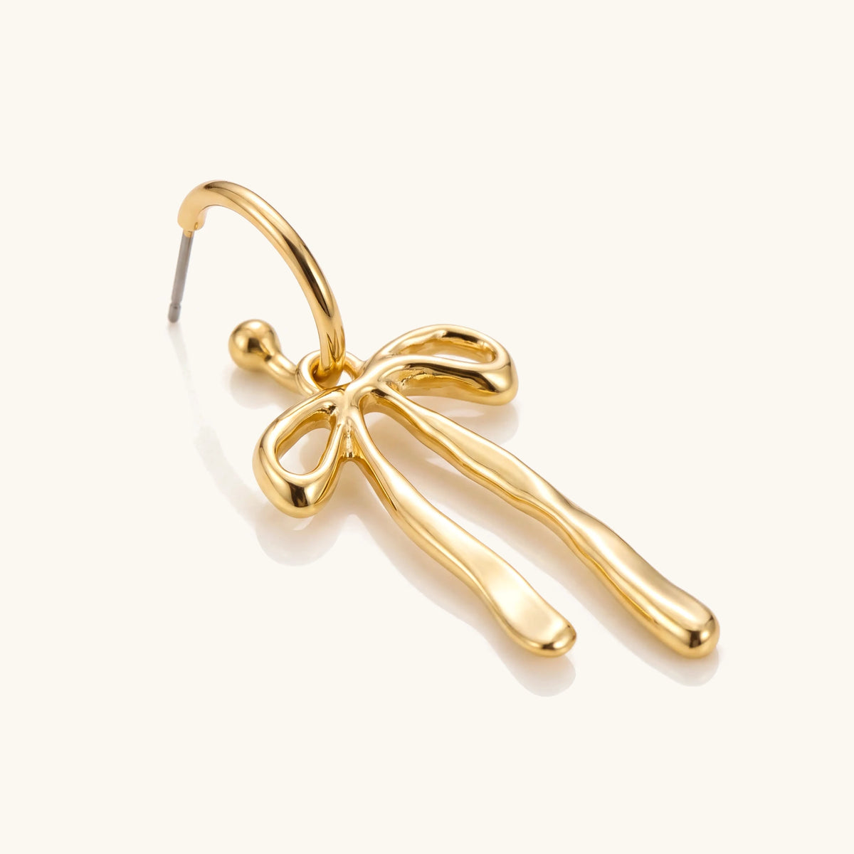 Chic Bow Hoop Earrings – angled close-up of the gold bow hoop detail