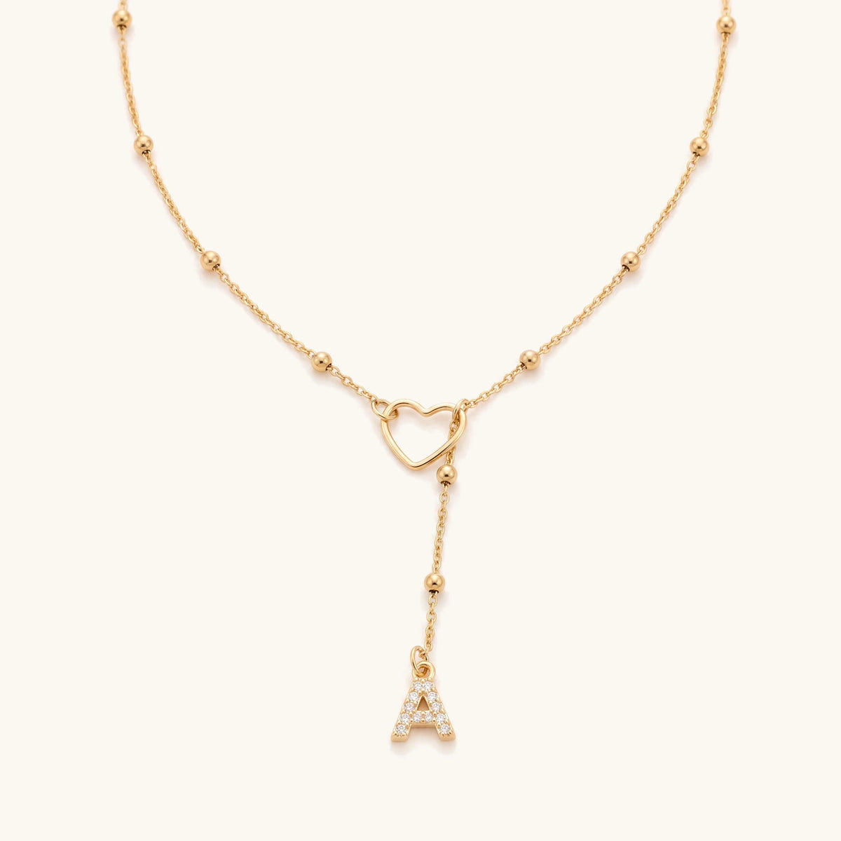 Dainty Diamond Letter Initial Lariat Necklace – gold satellite chain with open heart and pavé initial drop