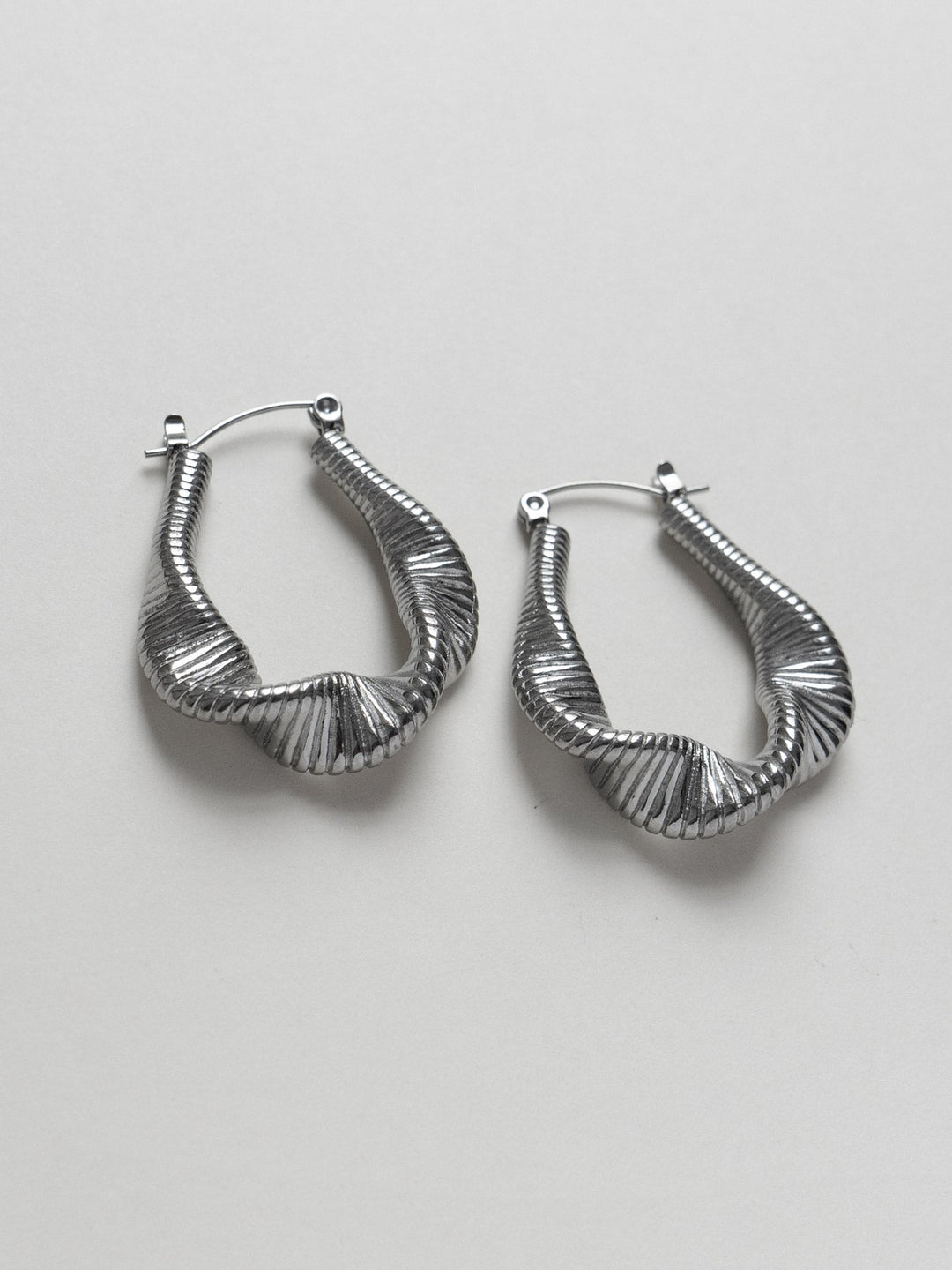 Lyra Silver Flowing Wave Hoop Earrings