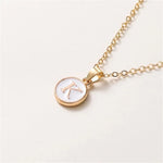 Load image into Gallery viewer, Gold Accented Circle Letter Initial Necklace
