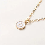 Load image into Gallery viewer, Gold Accented Circle Letter Initial Necklace
