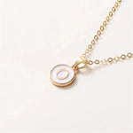 Load image into Gallery viewer, Gold Accented Circle Letter Initial Necklace
