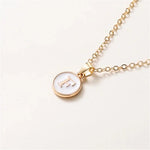Load image into Gallery viewer, Gold Accented Circle Letter Initial Necklace

