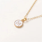 Load image into Gallery viewer, Gold Accented Circle Letter Initial Necklace
