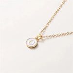 Load image into Gallery viewer, Gold Accented Circle Letter Initial Necklace
