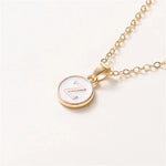 Load image into Gallery viewer, Gold Accented Circle Letter Initial Necklace
