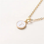 Load image into Gallery viewer, Gold Accented Circle Letter Initial Necklace
